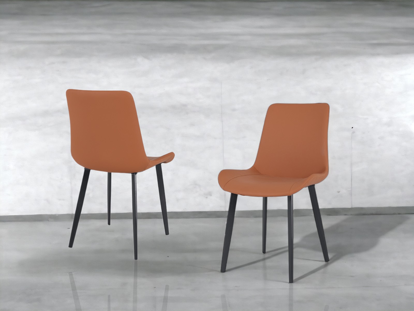 Camelia Set of 2 dining chair in camel pu-leather.