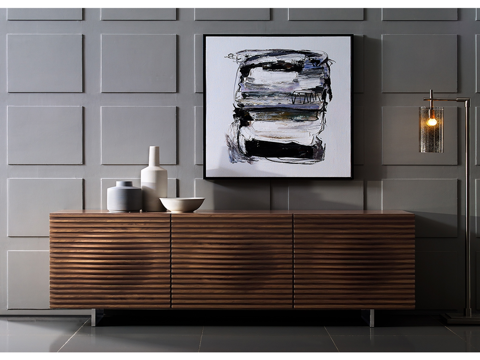 Moon entertainment center in walnut veneer with storage.